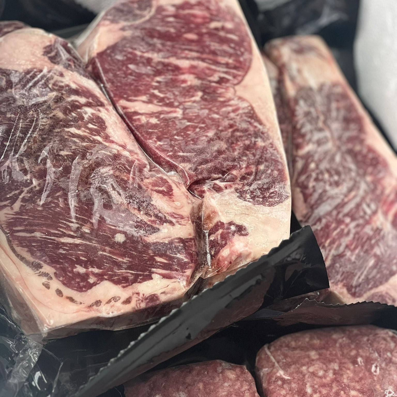 Pasture-raised New York strip steak, dry-aged for maximum tenderness and taste